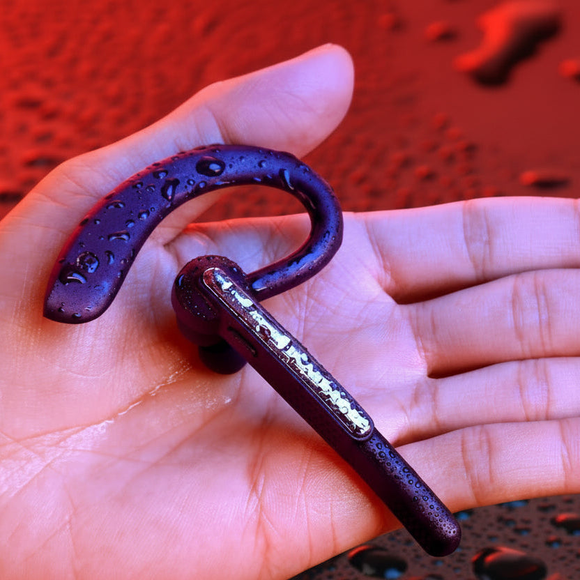 Hand holding a purple wireless earbud with water droplets, against a red background with text about waterproofing.