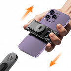 Hand holding a purple smartphone with a black clip accessory, on a white background.